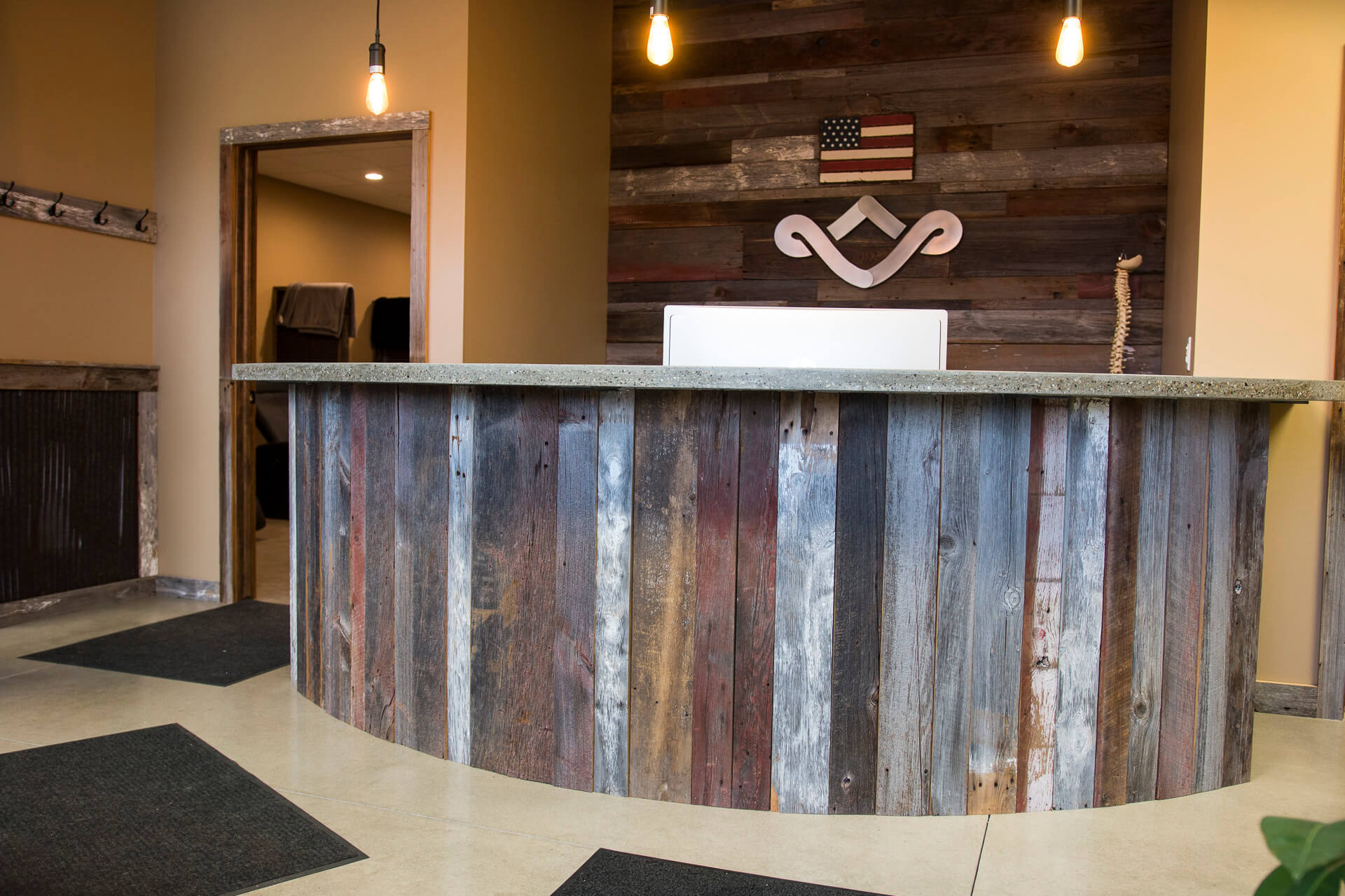 Lobby featuring barn wood and rustic lighting