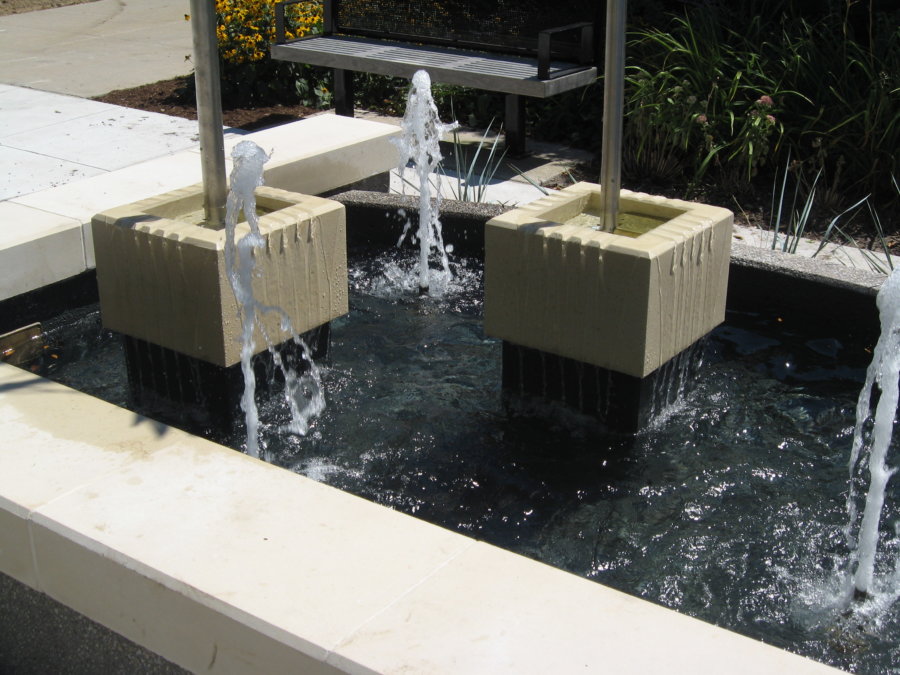 A fountain with two fountains and water jets.