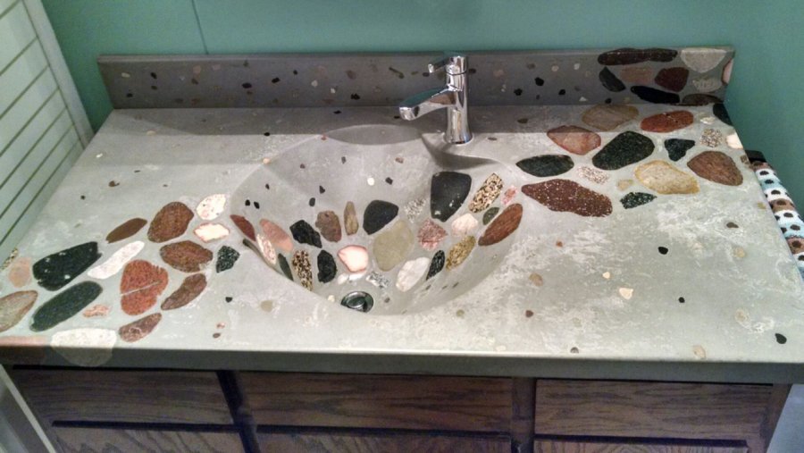A sink with some stones on it
