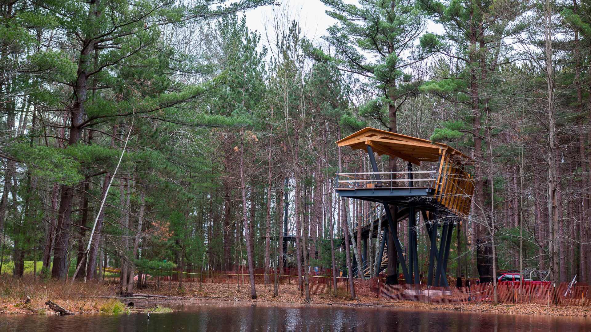 A tree house in the middle of a forest.